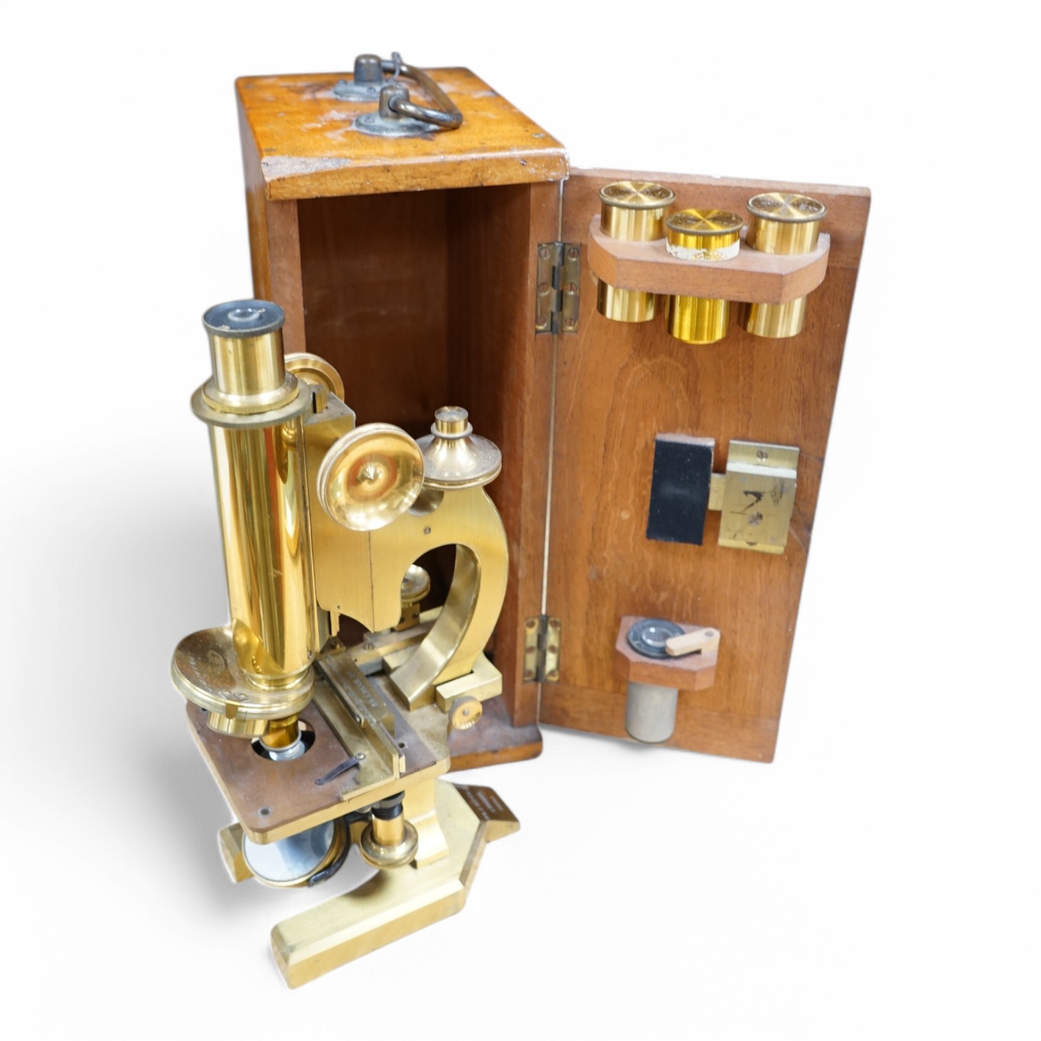 An R&J Beck London cased brass microscope, 31cm high. Condition - good